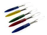 A selection of seam rippers on a white background