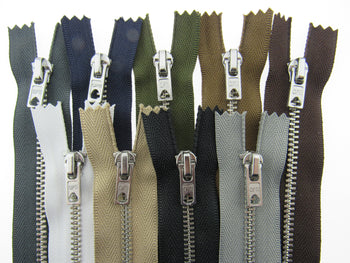 Metal closed end trouser zips