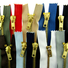 Jean zips in 10 different colours.  Yellow metal teeth