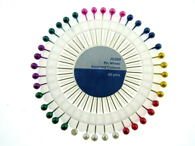 A front picture of a wheel of colour headed pins