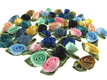 Satin ribbon bows in assorted colours for crafts gift wrapping and wedding favours