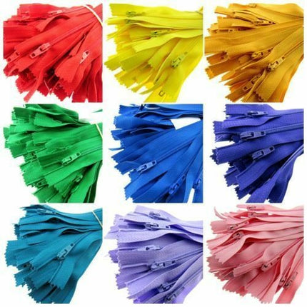 A product display grid showing 9 different bright and vibrant coloured Trebla nylon coil zippers for sewing crafts.
