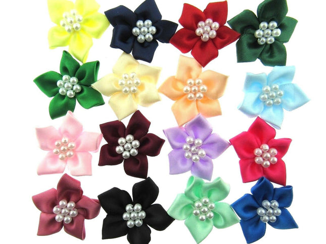 Colorful flowers with pearl centers arranged in a grid on a white background