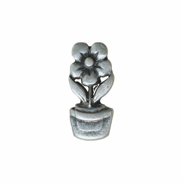 Silver flower-shaped object on a white background