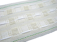 Close-up of a three inch cotton mix curtain tape on a white background