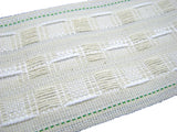 Close-up of a three inch cotton mix curtain tape on a white background