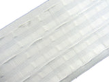 Close-up of white extra wide curtain tape on a white background