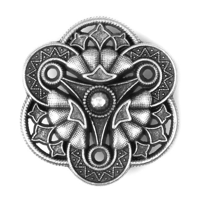 A single antique silver-coloured metal shank button with a floral shape and intricate detailing.