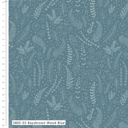 Fabric with white leaf pattern on a blue background, featuring a ruler for scale.