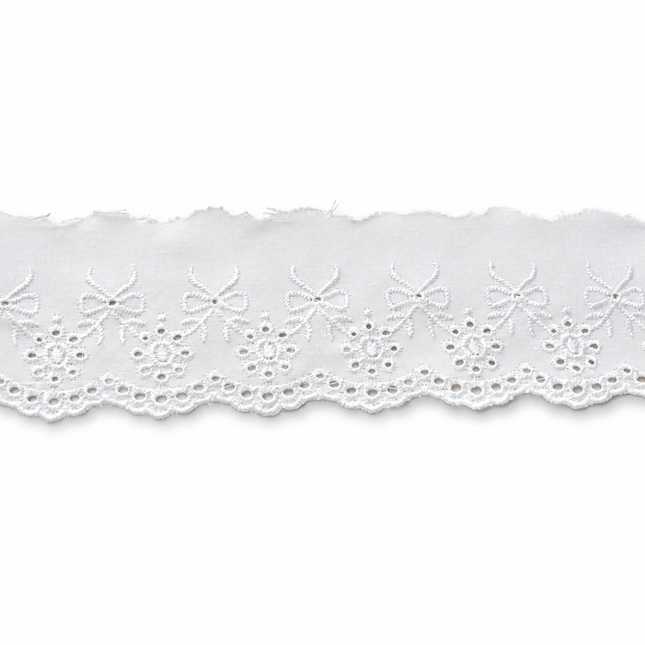 White eyelet lace trim with a scalloped edge and embroidered bow motifs, shown horizontally against a plain white background.