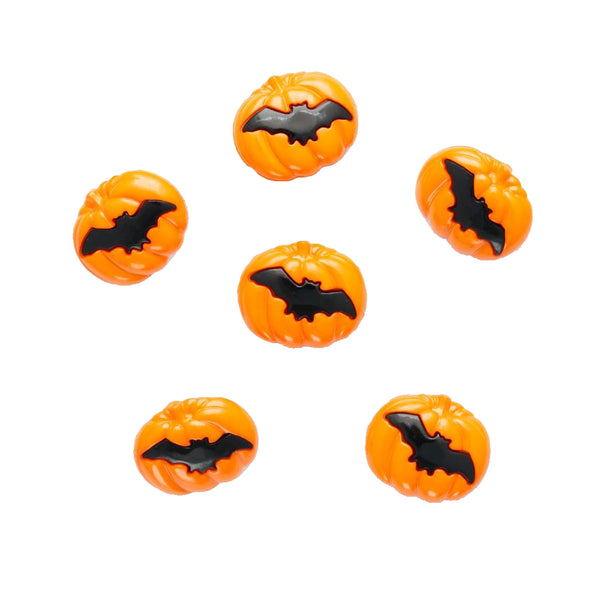 Orange Halloween cookies with black bat designs on a white background