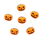Set of six small orange pumpkin-shaped objects with jack-o'-lantern faces on a white background.