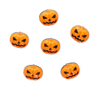 Set of six small orange pumpkin-shaped objects with jack-o'-lantern faces on a white background.