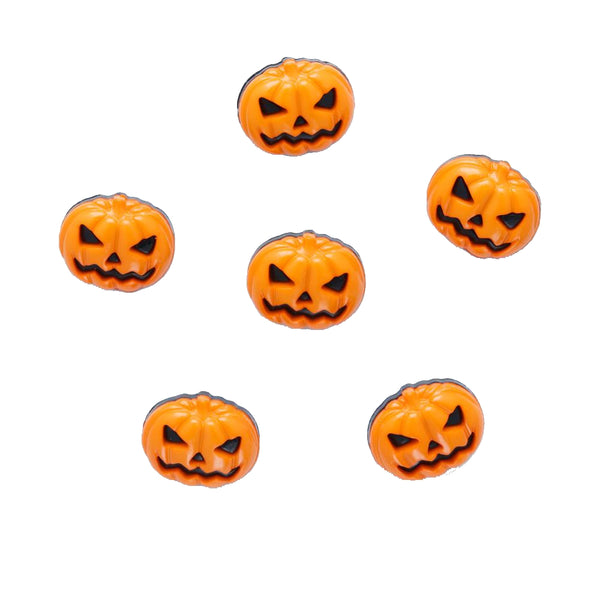 Set of six small orange pumpkin-shaped objects with jack-o'-lantern faces on a white background.