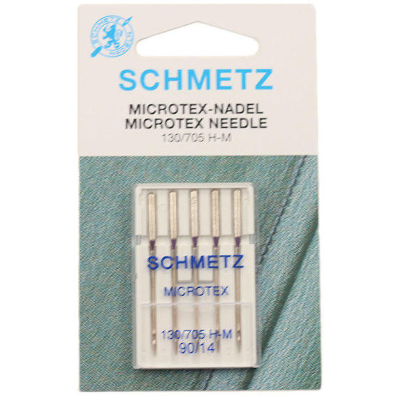 Packaging of SCHMETZ Microtex sewing machine needles, with five needles visible in a clear case against a blue fabric background.