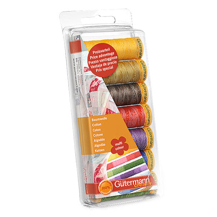 Gütermann multi-color sewing thread spool set in clear plastic packaging, featuring six different colored threads including yellow, brown, red, purple, green, and orange.