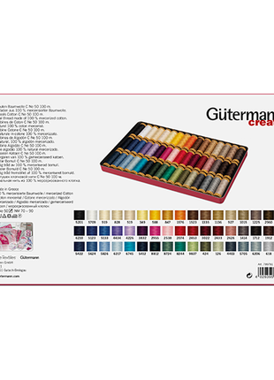 Assorted colours of premium Gutermann 100m cotton quilting thread reels inside metal case