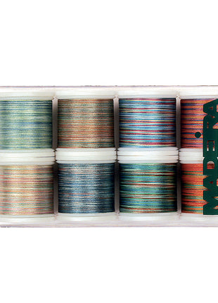 A set of Madeira Polyneon multicolored embroidery threads in 8x200m spools, displayed in a clear plastic case.