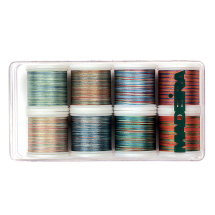 A set of Madeira Polyneon multicolored embroidery threads in 8x200m spools, displayed in a clear plastic case.