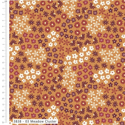 A repeating floral pattern swatch labeled '3838 - 03 Meadow Cluster' on a tan background, with small white, burgundy, and dark brown flowers and a ruler scale along the left edge.