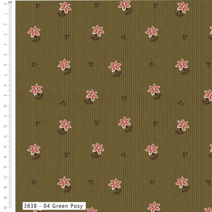 A close-up of a fabric with a vertical olive green base, featuring a repeating motif of pink flowers with white centers and small dark brown floral accents. A white measurement ruler is visible along the left edge, and a label at the bottom reads '3838 - 04 Green Posy'.