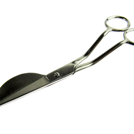 Metal applique scissors on a white background