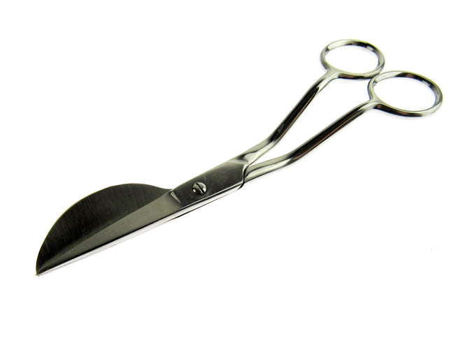 Metal applique scissors on a white background