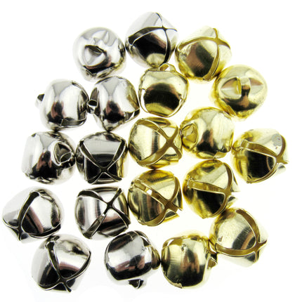 A pile of small metallic bells in silver and gold finishes, arranged on a plain white background.