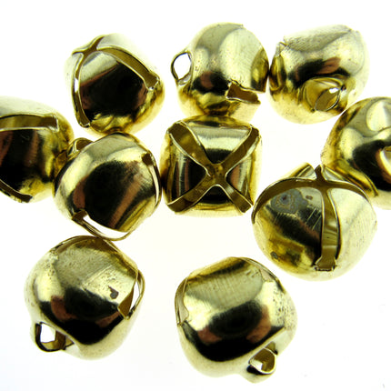 A group of small metallic gold jingle bells with hanging loops, arranged on a plain white background.