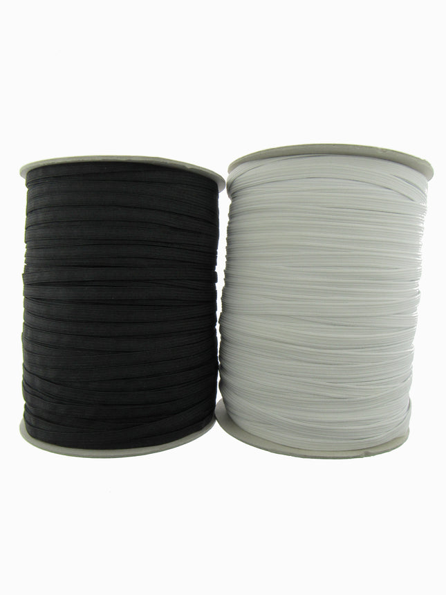 Two spools of elastic cord, one black and one white, shown side-by-side on a plain white background.