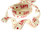 Ribbon with 'LOVE' and heart patterns on a white background