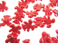 Red gummy bears on a white background