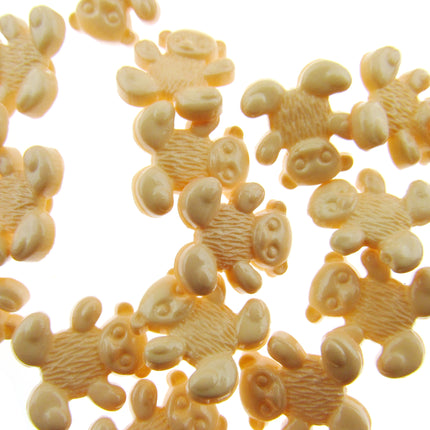 Peach teddy bear buttons  on a white background
