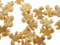 Peach teddy bear buttons  on a white background