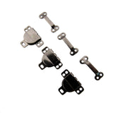 Set of metal skirt hooks on a white background