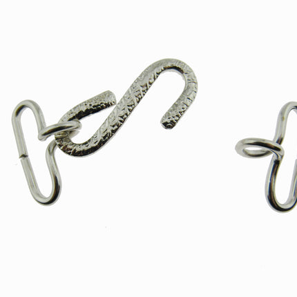 Silver snake buckle on a white background