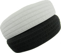 Close up of black and white waspie elastic, on a white background.