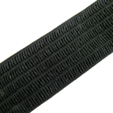 Close-up of a black woven waspie elastic on a white background