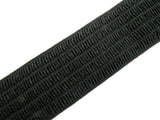 Close-up of a black woven waspie elastic on a white background