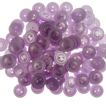 Collection of purple buttons on a white background