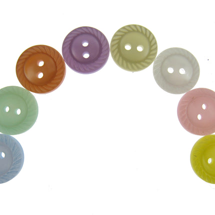 Assorted colorful buttons arranged in a circular pattern on a white background