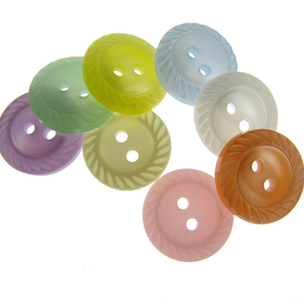 Assorted colorful buttons on a white background