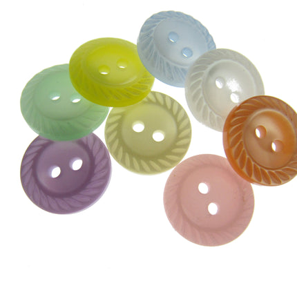 Assorted colorful buttons on a white background
