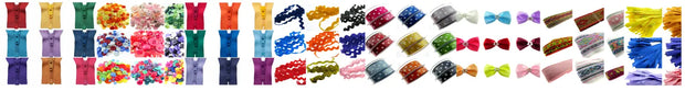 Collection of various colorful hair bows on a white background