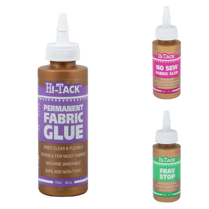 Three Hi-Tack fabric glue bottles on a white background: a large bottle of Permanent Fabric Glue in the center-left, a smaller bottle of No Sew Fabric Glue in the upper right, and a small bottle of Fray Stop in the lower right. The bottles are amber-brown with white caps and colored labels in purple, pink, and green.