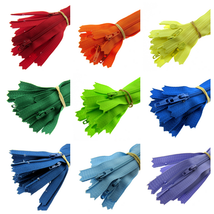 Assorted colorful YKK nylon closed-end zippers displayed in sets according to color.