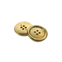 Two gold buttons with a textured design on a white background