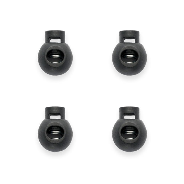 Four black cord lock cord ends on a white background