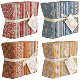 Four bundles of Tilda Creating memories floral fabric Fat Quarters with matching tags on a white background