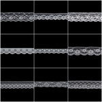 White lace trim on a black background